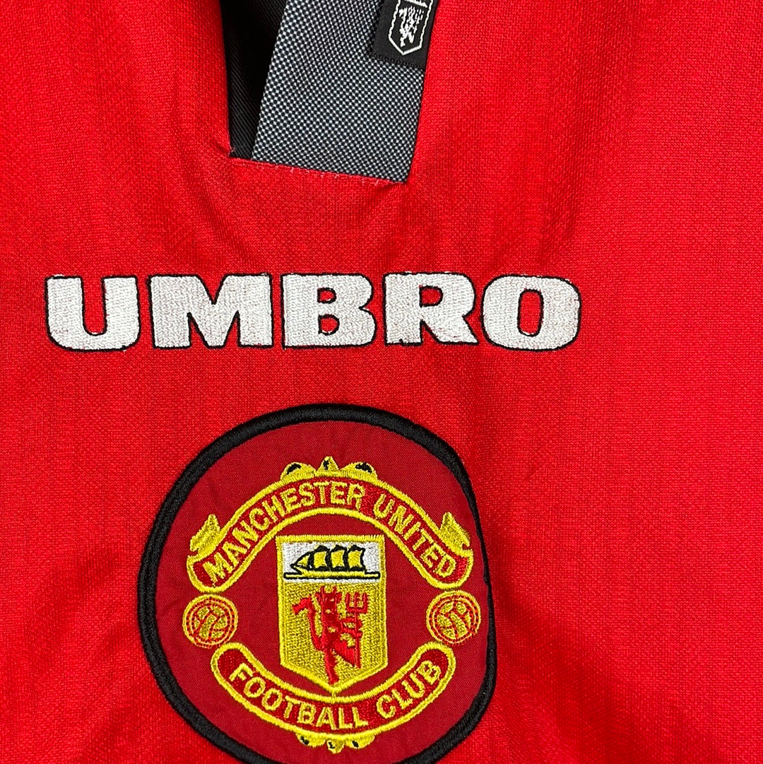 UMBRO on the front is fully embroidered - correct for a players shirt in 1997/1998