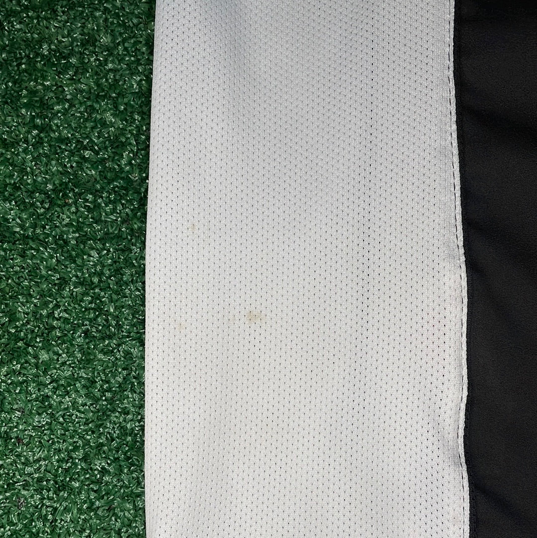 Minor marks on left back of shirt